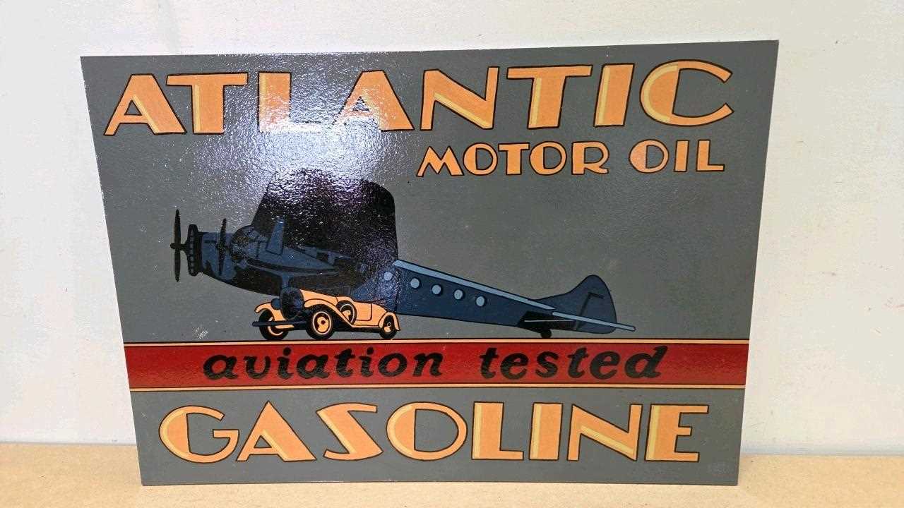 Lot 67 - WOODEN HAND PAINTED ATLANTIC MOTOR OIL SIGN 28" X 20"