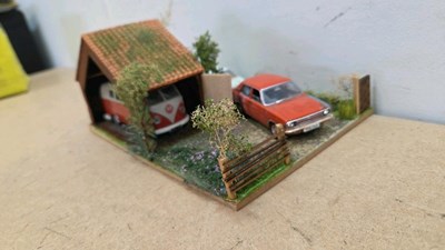 Lot 669 - 1.43 SCALE VEHICLE GARAGE DIORAMA MODEL 8.5" X 6"
