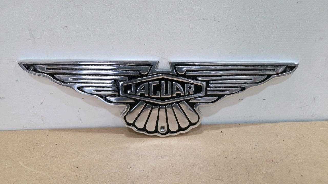 Lot 159 - JAGUAR ALLY REPRO CAST SIGN 19" X 6"