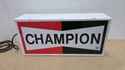 Lot 65 - CHAMPION LIGHT UP SIGN 23" X 11"