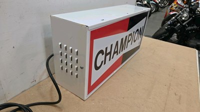 Lot 65 - CHAMPION LIGHT UP SIGN 23" X 11"
