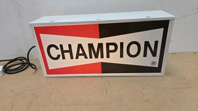 Lot 65 - CHAMPION LIGHT UP SIGN 23" X 11"