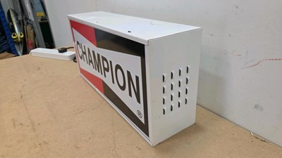 Lot 65 - CHAMPION LIGHT UP SIGN 23" X 11"