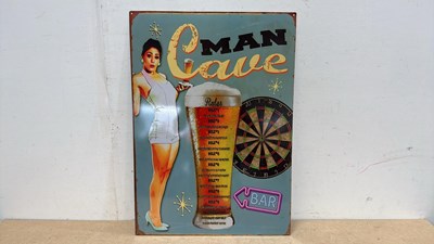 Lot 497 - MAN CAVE TIN REPRO SIGN 27" X 20"
