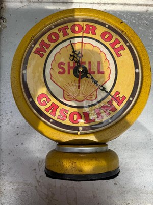 Lot 69 - SHELL STYLE CLOCK 12"