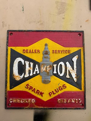 Lot 569 - CHAMPION SPARK PLUGS CAST SIGN 10" X 10"