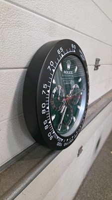 Lot 37 - ROLEX STYLE DAYTONA BLACK/GREEN WALL CLOCK