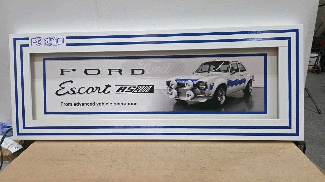 Lot 65 - LARGE ILLUMINATED FORD ESCORT RS2000 SIGN 65" X 25"