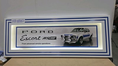 Lot 65 - LARGE ILLUMINATED FORD ESCORT RS2000 SIGN 65" X 25"