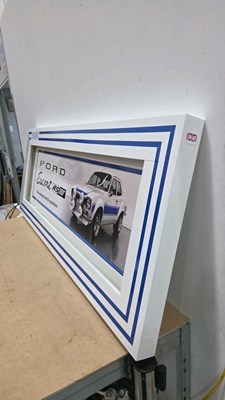 Lot 65 - LARGE ILLUMINATED FORD ESCORT RS2000 SIGN 65" X 25"