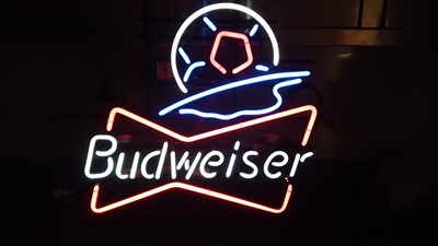 Lot 21 - NEON BUDWEISER SIGN WITH BASEBALL CAP AT THE TOP