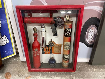 Lot 246 - FIRE MEMORABILIA IN GLASS CASE