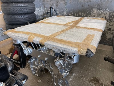 Lot 231 - JAGUAR V12 COFFEE TABLE WITH GLASS TOP