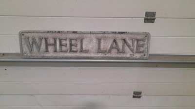 Lot 215 - WHEEL LANE CAST ALUMINIUM  SIGN
